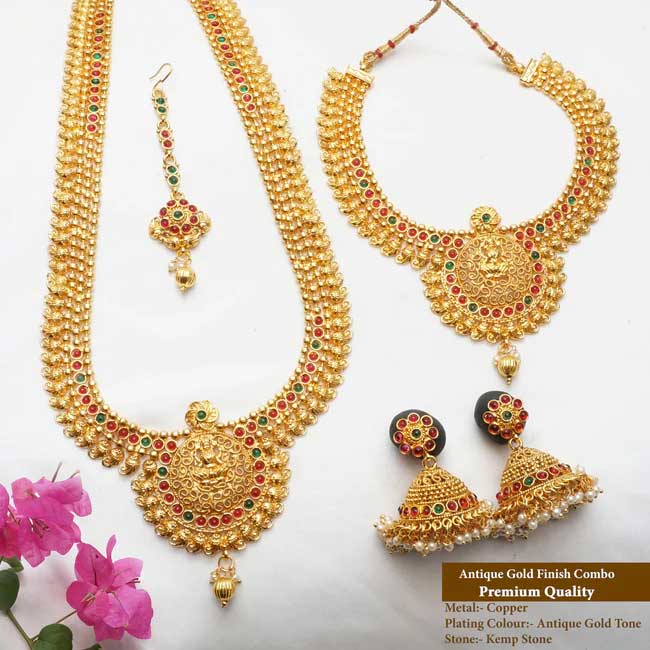 This haram set has a unique design that ties it to its true Indian roots. It has the glorious shine of kempu stone and the special Bandhai stone that come together beautifully with the antique plating.

Stand out from the crowd whenever you wear it, everywhere you wear it. Its unique design and a beautiful structure make it extra special. It�s a must-have in every jewel box.

Product Details
The total length of the Short necklace is 8 Inches (4 inches on both sides).
The total length of the long necklace is 18 Inches (9 inches on both sides).
The height of the earrings is  2.5 cm and the width is  1.5 cm.
Necklace back site adjustable rope is attached.
Earrings lock is a press type.
100% made with love in India
We manufacture, design, and sell all of our jewelry.