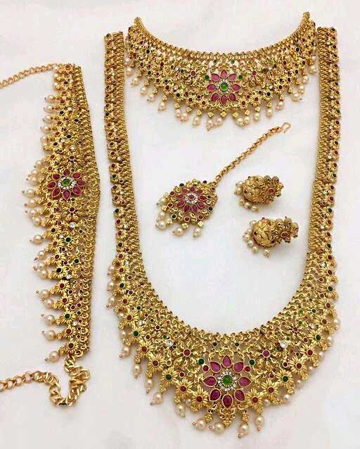 Base Metal: Plastic

Plating: Gold Plated - Matte

Stone Type: Artificial Stones

Sizing: Adjustable

Type: Full Bridal Set

Net Quantity (N): 2 Necklaces (For J-Set)