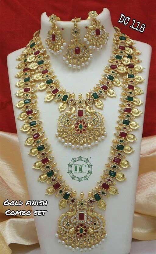 Base Metal: Alloy
Plating: Gold Plated
Stone Type: Cubic Zirconia
Sizing: Adjustable
Type: Haram and Earrings
Net Quantity (N): 2 Necklaces (For J-Set)
gold finish combo set
Country of Origin: India