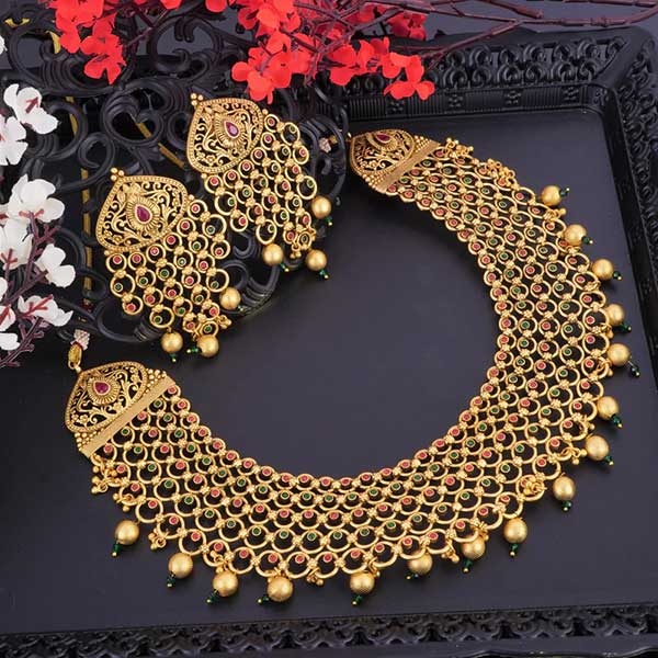 Design :- Bridal Jewelry

Material :- Copper-Brass

Stone Color :-Maroon-Green

Plating color :- Antique Gold

Products Includes:-

Earrings (Push Back),

Choker Necklace (Adjustable Thread)