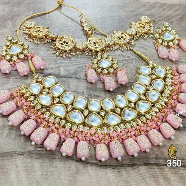 Blush pink kundan bridal set earrings and maang tikka jewellery set by zevar