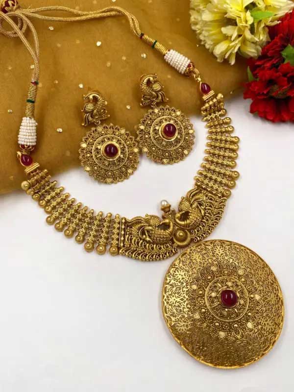 Traditional handcrafted gold plated antique necklace set from the house of the Gehna Shop.